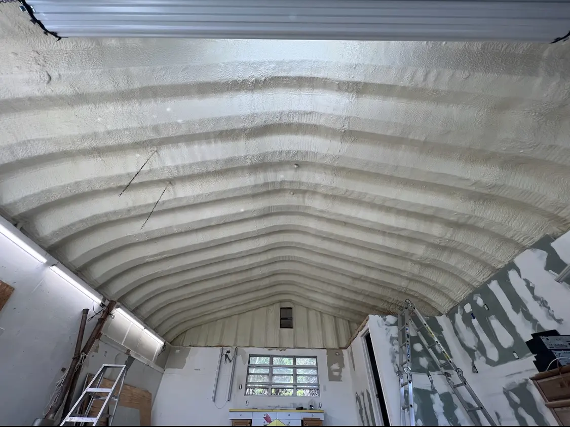 Spray polyurethane foam applied to the underside of a metal roof deck in San Jacinto